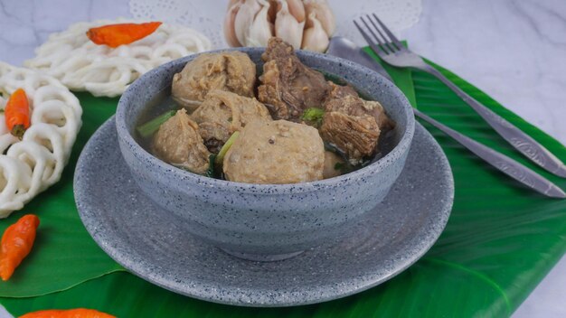 Image of indonesian meat balls 'bakso homemade served in ceramic bowl selective focus