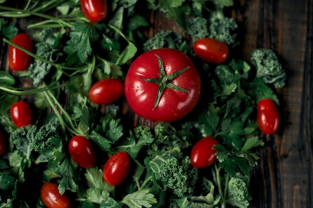 Image lots of fresh tomatoes and parsley