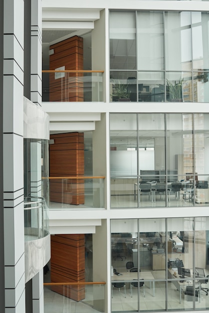 Image of modern office building with glass walls and windows