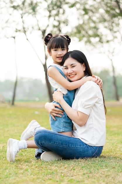 Image of mother and daughter playing in the park