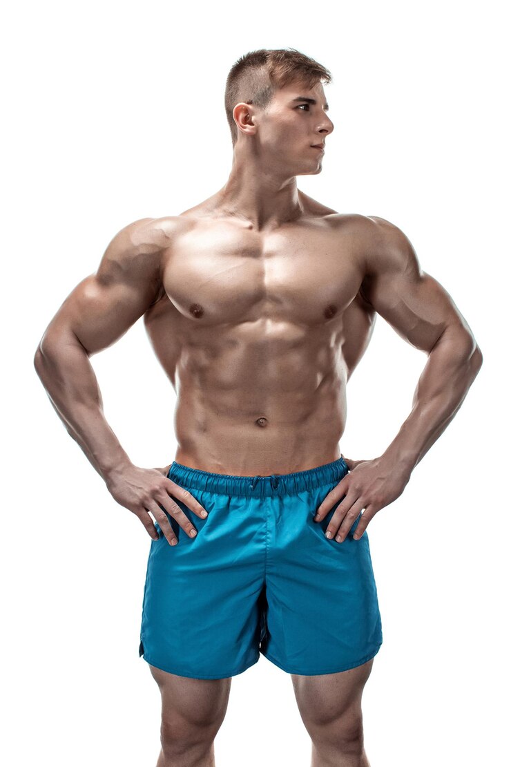 Image of muscle man posing in studio