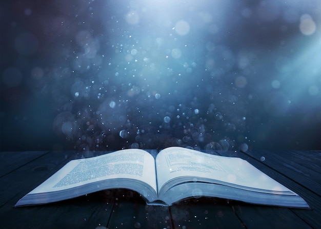 image of open antique book on wooden table