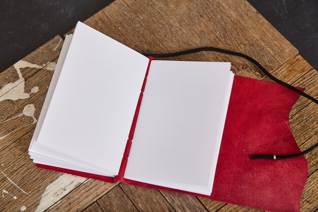 Image of Pages blank of open journal sketchbook with red leather