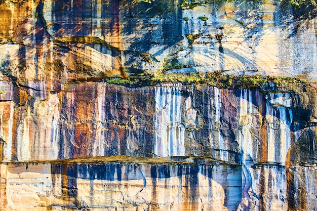 Image of Pictured Rocks with multicolored section of stone