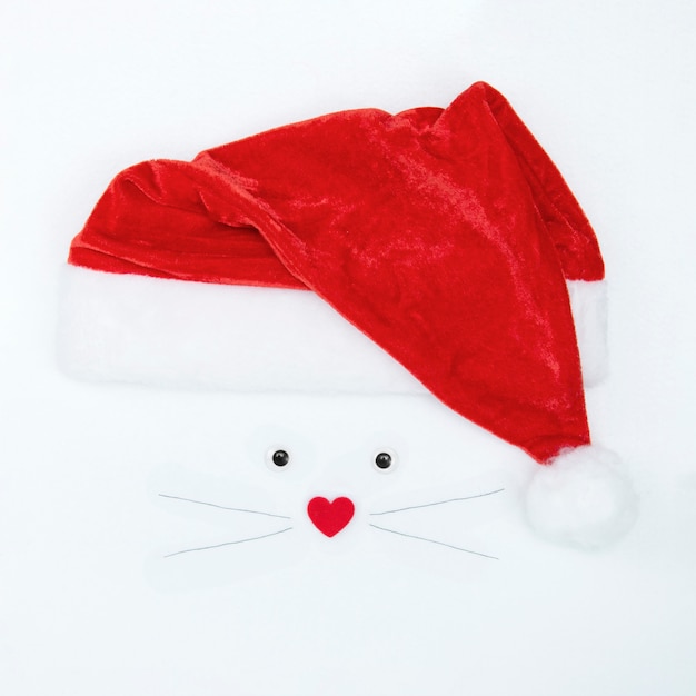 Image, portrait of 2020 rat symbol, mouse in santa claus hat