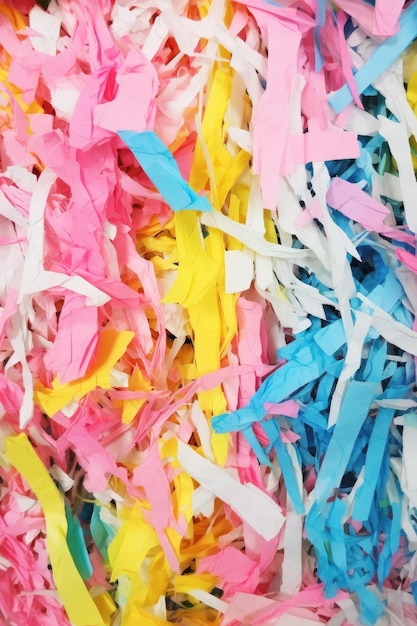 Photo image of portrait colorful shredded papers full frame