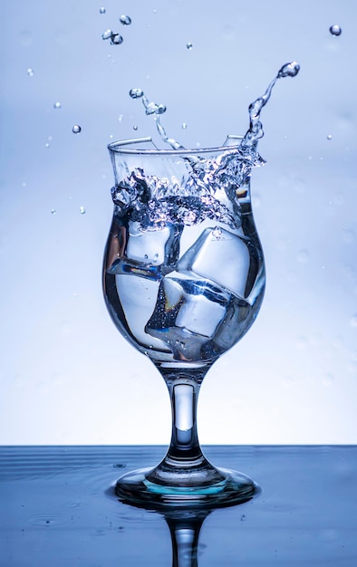 The image of pouring drinking water into a glass