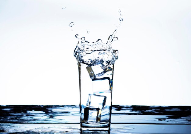 The image of pouring drinking water into a glass