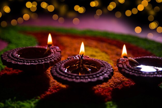 Photo image of realistic golden candle for diwali on a gradient background