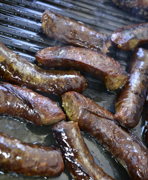 image of a sausages on a grillfat food