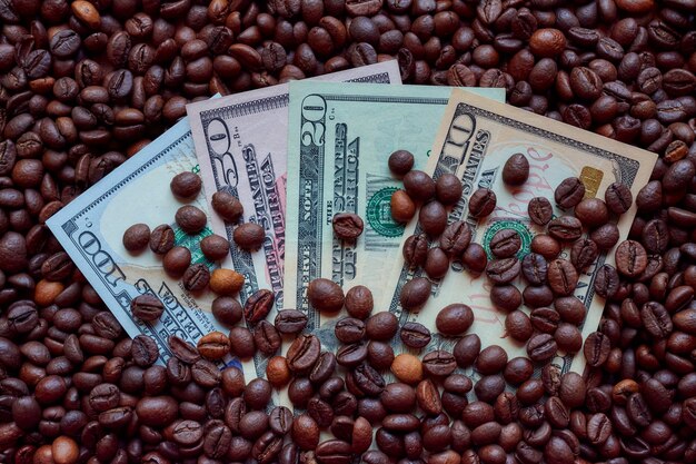 Photo image of several dollars in coffee beans.