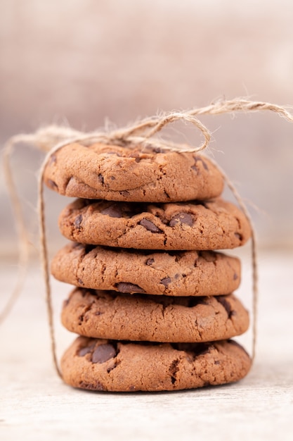 Image shows a stack of american chocolate chip cookies