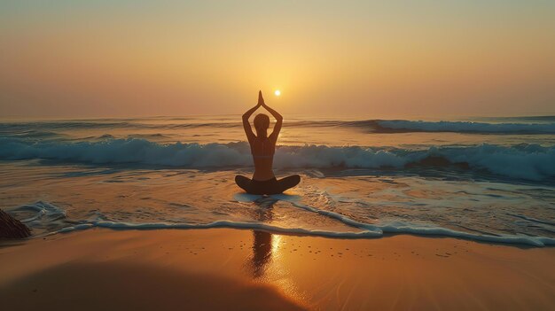 The image shows a woman in a yoga pose on the beach She is wearing a swimsuit and is sitting with her legs crossed and her arms raised in the air