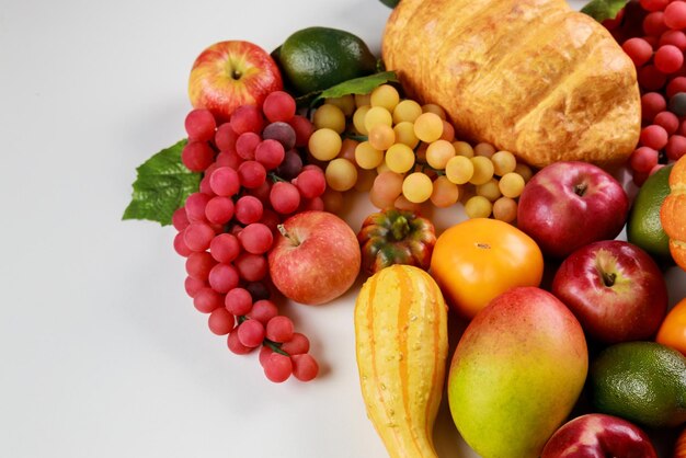 An image of a table with fruit and vegetables as a background