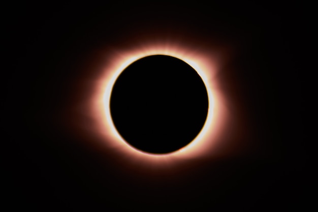 Photo image of total eclipse of the sun in a solar eclipse