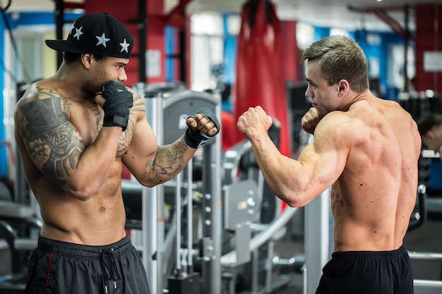 An image of two men at the gym