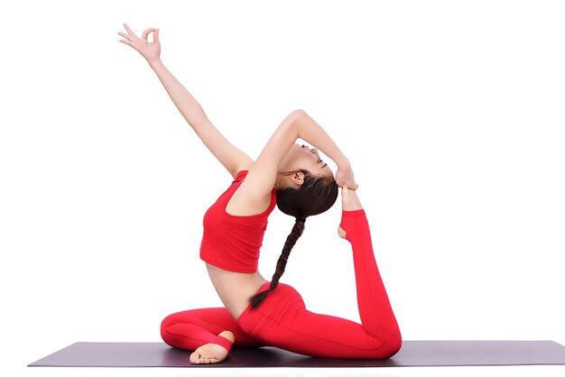 Photo image of woman practicing yoga beautiful yoga movements practicing yoga at home