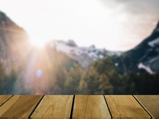 image of wooden table in front of abstract blurred background of natural snow and mountains