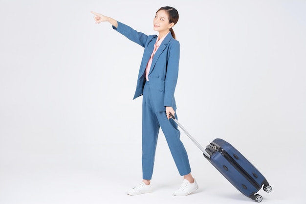 Image of young Asian businesswoman travel