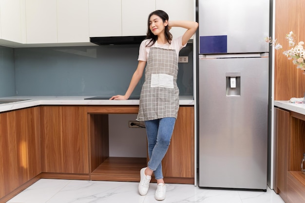 Image of young asian woman at home