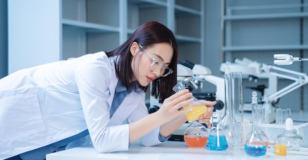 Image of young asian woman working in the lab