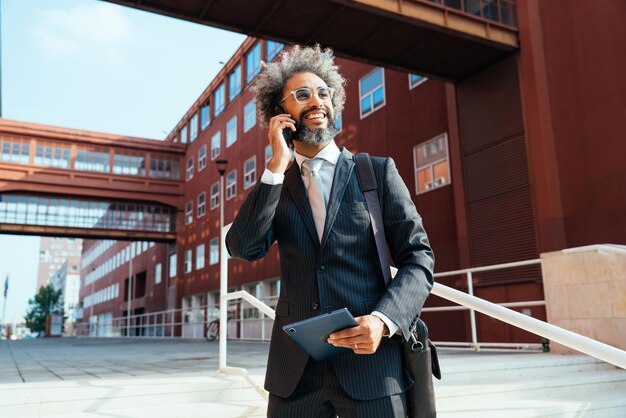 Image of a young entrepreneur working outdoor the office