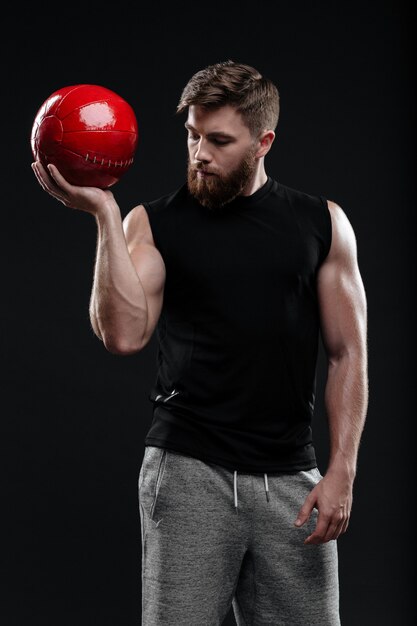 Image of young trainer holding ball