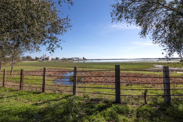 Immerse yourself in the serene beauty of the Rocio village marshes in Huelva Spain