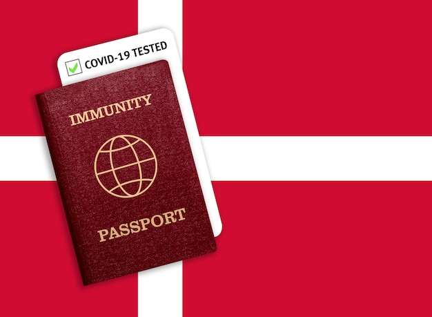 Immunity passport  on the national flag of Denmark