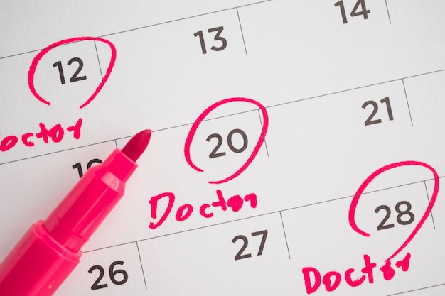 Photo important doctor appointment schedule write on white calendar