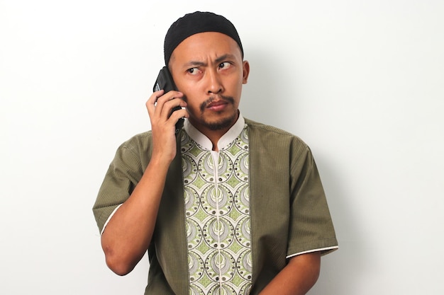 Important Phone Call Indonesian Man Deep in Thought