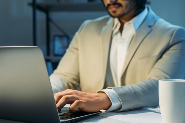 Important work male chief deadline project unrecognizable man in elegant suit typing laptop sitting