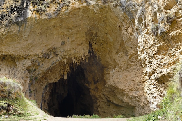 Imposing entrance to the cave of Huagapo in Tarma