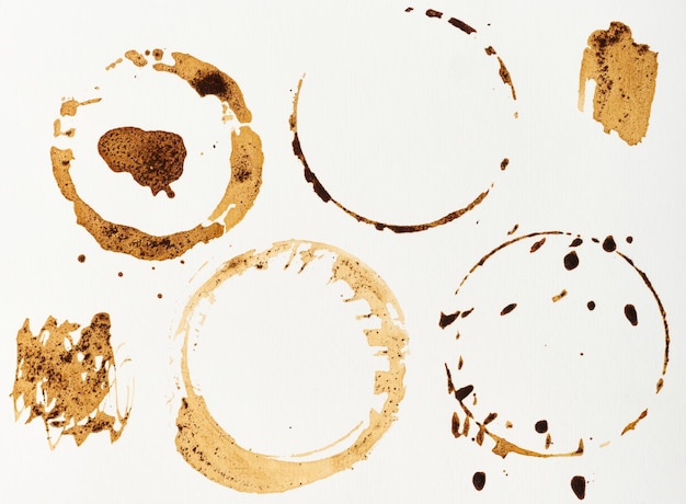 Photo imprint of spilled black coffee on a white isolated background set