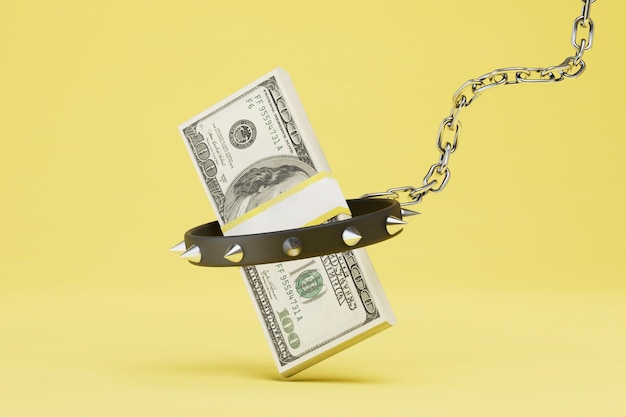 Inability to spend money a wad of dollars in a collar and on a metal chain on a yellow background