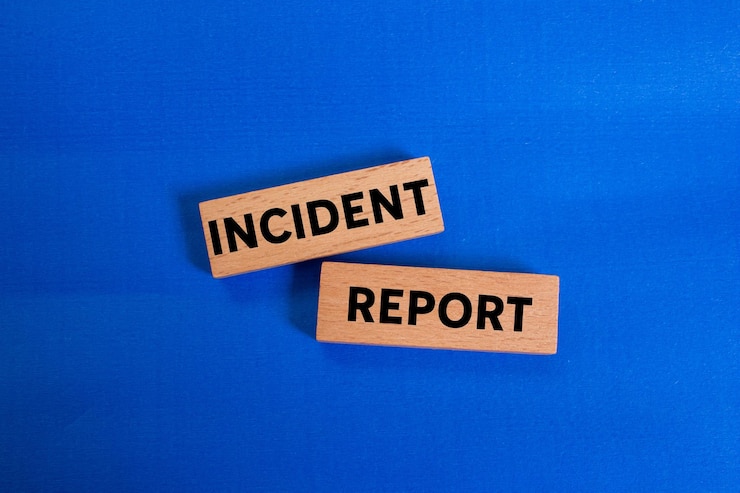 Photo incident report message written on wooden blocks on blue background conceptual incident report symbol copy space