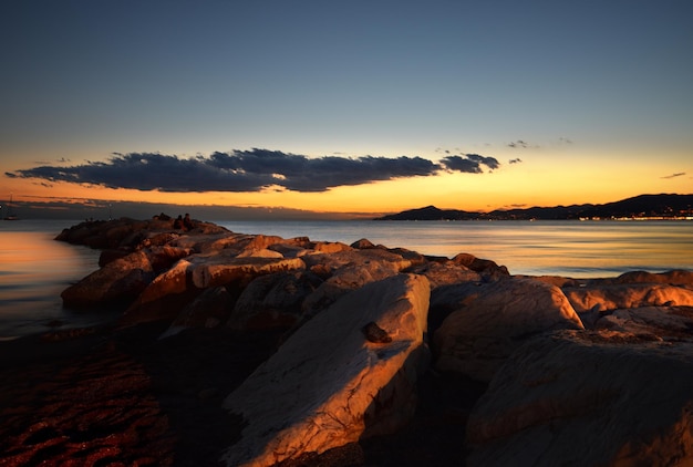 incredible colors and lights for a romantic sunset over the sea in Liguria