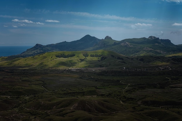 Incredibly beautiful landscape view from the mountain to the valley before a thunderstorm in spring