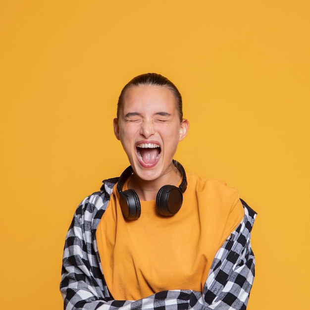 Incredibly happy woman with headphones