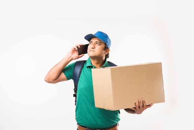 Indian or Asian Handsome Delivery Man with Box and Check List, isolated