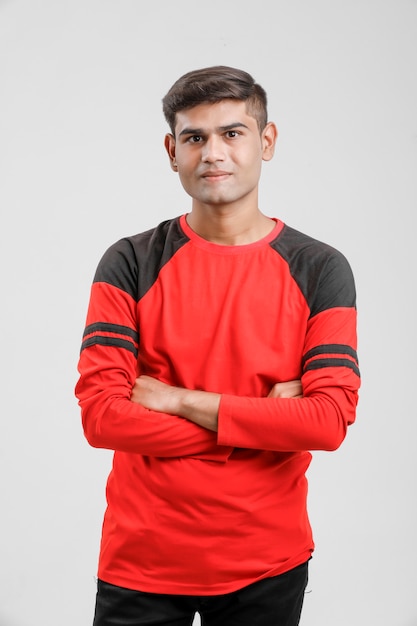 Indian / Asian man in red T-shirt and showing multiple expression over white 