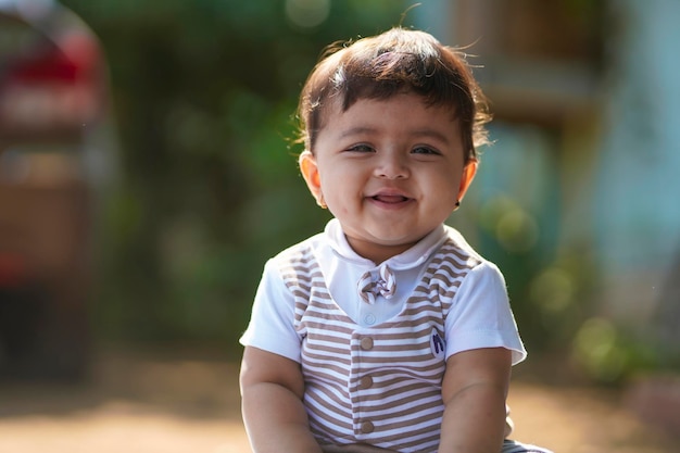 Indian baby girl smiling and giving expression