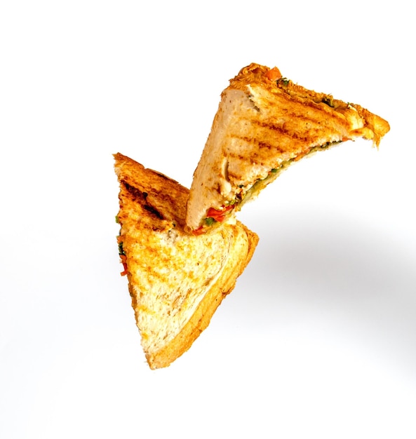 Indian baked veg sandwitch flying white background