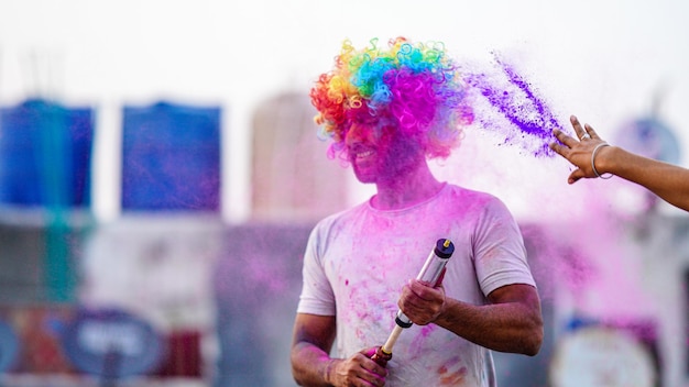 A indian boy playing holi image HD