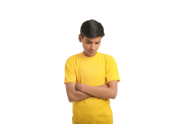 Indian boy thinking some idea on white background