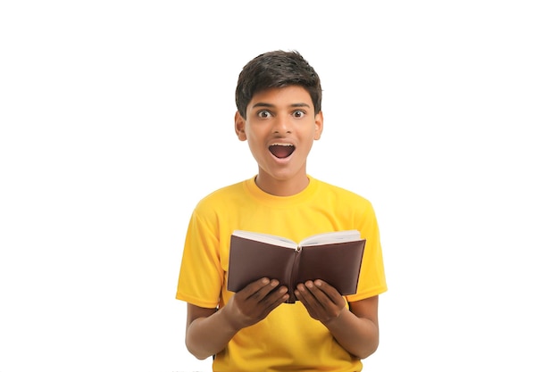 Indian boy with diary on white background