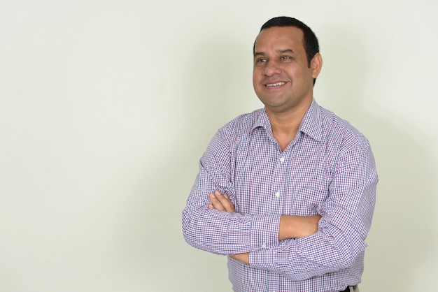 Indian businessman with short hair on white