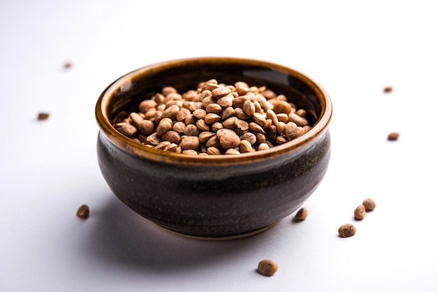 Indian charolya, Buchanania lanzan, Almondette kernel seeds in a bowl or pile. selective focus