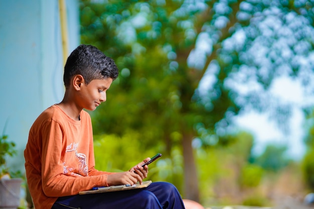 Indian child attending online lecture