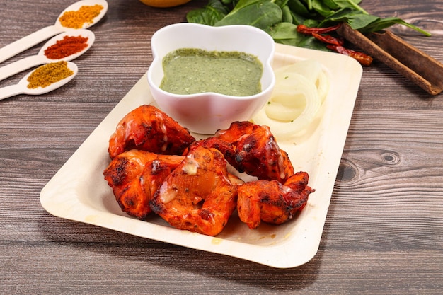 Indian cuisine Chicken tikka barbecue with herbs and spices